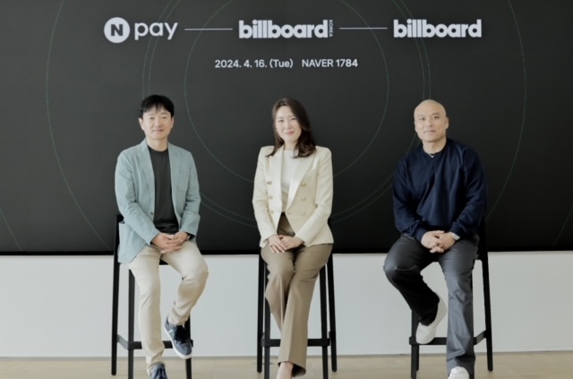 NAVER Pay CEO Park Sang-jin, Billboard Korea CEO and publisher Yuna Kim, and Billboard President Mike Van sign an MOU on April 16, 2024.