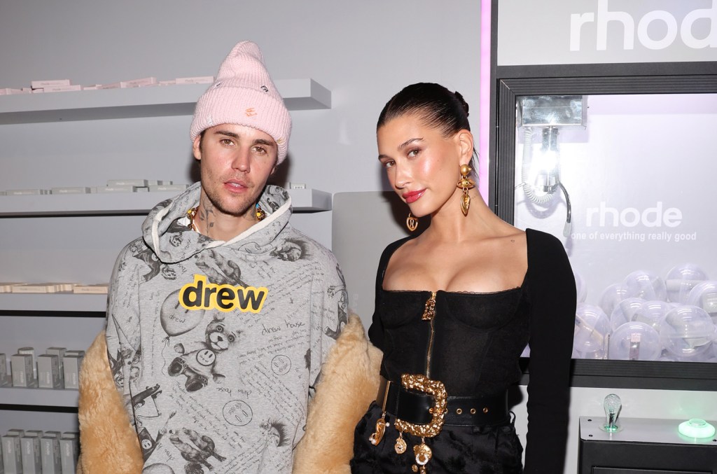 Justin Bieber hugs wife Hailey's baby in sweet pregnancy photos