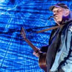 Neil Young, after canceling Crazy Horse tour dates, to perform at Farm Aid 2024