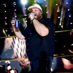 Watch Luke Combs Shotguns Beers With Glen Powell & 'Twisters' Co-Stars in NJ Concert