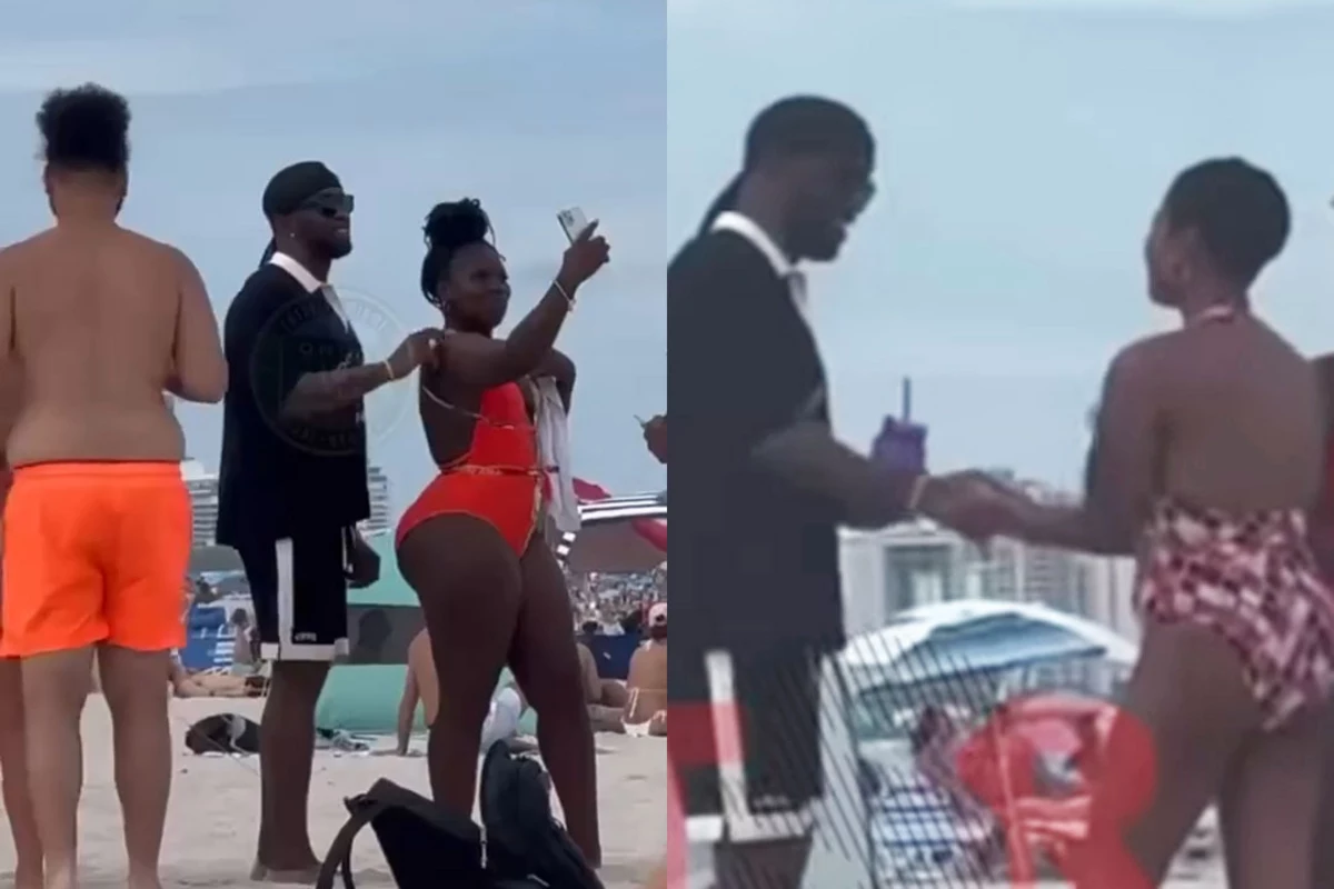 Diddy takes pictures and chats with women on Miami Beach