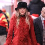 Taylor Swift arrives at the Chiefs Game rocking a red faux fur coat